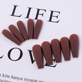 Detail of matte dark red-brown press-on nails showing smooth frosted finish texture - Dark Coffee