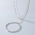 Dettaglio del set collana e bracciale in acciaio inox con catena cubana e rombi - Bracciale 19CM / Color Acciaio