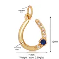 18K gold horseshoe pendant with white zircon and dark blue gemstone accents - Blue Zircon Horseshoe / Gold