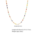 Dettaglio collana dorata 40-45cm con perle sfaccettate colorate da 0,26cm su sfondo bianco - Collana con Perline a Cubo Multicolore (NC-1910G)
