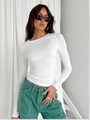Close-up of white slim-fit long-sleeved knit top with round neck and premium texture - XS / Tops / White