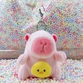 Pink capybara plush keychain with small yellow chick accent and silver metal ring - Holding Chick Pink + Silver Clip