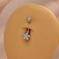 Silver flower belly ring with clear cubic zirconia on silicone model for navel piercing - Small Flower Style (DZ-033)