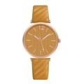 Detail of ginger leather strap with woven texture and rose gold leaf pattern dial - Yellow Watch Only