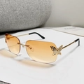 Frameless square sunglasses with gradient orange lenses and rhinestone butterfly detail - Double Orange