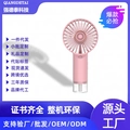 Pink portable handheld misting fan with cooling spray function and compact charging base - Handheld Misting Fan / Pink / 1200mAh