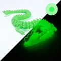 Detailed comparison of 3D printed articulated dragon in normal and green glow effect - 30CM Glow in Dark Green