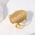 Detailed close-up of gold stainless steel ring with an embossed evil eye oval design - US 7 / Oval Textured Pattern (JR104) / Gold
