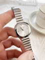 Elegant silver square quartz watch with metal stretch band worn on a wrist - Silver White Dial