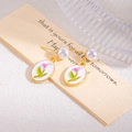 Elegant floral pearl drop earrings featuring pink tulip glaze pendants and gold finish - Pearl Tulip Enamel Drop Earrings