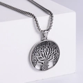Minimalist silver stainless steel Tree of Life pendant necklace on a white geometric stand - Steel Color With Chain (3.5x60mm)