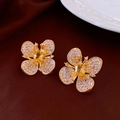 Macro detail of gold flower earrings with pink diamonds and a yellow crystal center - 31# Colorful Butterfly with Diamonds Gold Plated (925 Sterling Silver Earring Post)