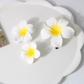 Set of three white frangipani flower hair clips on a cloud plate for beach vacation - Three-Piece Set / White