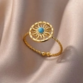 Macro view of 18K gold stainless steel ring with turquoise inlay and sunburst design - Gold Sun Turquoise Style (G12014228G-5) / Gold