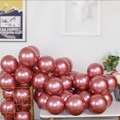 Glossy rose gold metallic balloons for party decor arranged in a gold storage basket - Metallic Red - Small