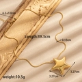 Minimalist gold star pendant necklace in titanium steel with flat lay styling - Gold Medium Star Necklace (NK-241)
