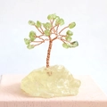 Green crystal money tree figurine on raw citrine base with copper wire branches - Peridot Tree + Yellow Base