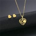 Detailed view of golden heart jewelry set with LOVE U Mama hollow engraving on dark stand - TZ-213 Gold/LOVE U Mama Heart
