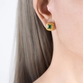Vintage style square green zircon earrings with golden twisted metal border on model - Gold Green Glass Stone Earrings