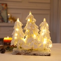 Three mini snow-flocked Christmas trees with warm LED lights on a rustic wood base - White Triple Tree Style (35cm)