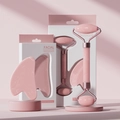 Pink facial massager set with double-headed roller and heart-shaped gua sha tool - Pink Facial Roller And Heart Shaped Gua Sha Board Set