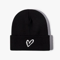 Unisex black knit beanie with white embroidered heart detail for winter warmth - One Size / Black