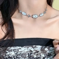 Retro silver necklace featuring butterfly motif and Baby script charms on a model - Butterfly Nameplate Baby Letter Necklace