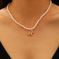 Dettaglio dell'elegante collana di perle con ciondolo a forma di cane palloncino - Perla Artificiale Cane Palloncino (K-244)
