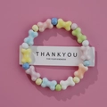 Pastel Jingdezhen ceramic bracelet with colorful bone shaped beads on pink background - Pastel Bone Round (1586-06)