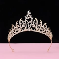 Detailed view of luxury gold crown with sparkling teardrop and round rhinestones - No.13 KC Gold (White Stone)