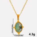 Macro detail of oval abalone shell pendant with 2.4cm height and 1.5cm width dimensions - Gold Rainbow Abalone Shell Necklace (S2002-G-B-N22)