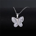 Silver butterfly necklace with micro-pave white crystals on a black display stand - NZ21 Butterfly Hollow
