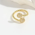 Bague ouverte dorée minimaliste avec perles polies et détails de pierres brillantes - Style Perle Ronde