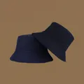 Detail view of foldable navy blue cotton sun hat with wide brim for UV protection - M (56-58cm) / Navy Blue & Black