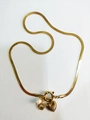 Gold flat snake chain necklace featuring heart, pearl, and letter G charms for women - Letter G