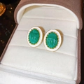 Vintage oval gold earrings with green textured stone and white enamel detail in a box - 19 Silver Pin-Green Oval