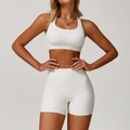 White two-piece yoga set featuring a racerback sports bra and high-waisted seamless shorts - M / Apricot White-Shorts Set