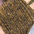 Faceted Tiger Eye natural stone beads with golden brown hues and cat eye effect - Grade B Tiger Eye 3mm