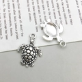 Antique silver sea turtle alloy pendants showing detailed front and smooth back views - 1Pc Antique Silver Sea Turtle 15*23mm