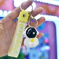 Creative white astronaut keychain with a yellow silicone strap and gold metal clasp - Light-up Astronaut [White]