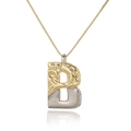 Detailed view of two-tone letter B pendant with rock texture and gold chain on white back - Letter B