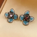 Detail of vintage butterfly earring with purple gems and blue zircons on gold satin - Silver Earring Post - Gun Black - Blue