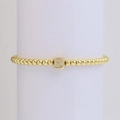 Elegant 18k gold beaded elastic bracelet with a sparkling crystal square letter K pendant - Letter K