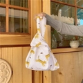 Detail of Japanese linen knot bag with cat prints and I AM NOT A CAT text slogan - Small Yellow Cat
