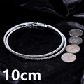 Oversized 10cm silver hoop earrings with full crystal rhinestones on velvet background - Silver 10cm