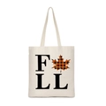 Detailed close-up of a canvas tote bag featuring an autumn-themed FALL print and maple leaf - Plaid Maple Fall