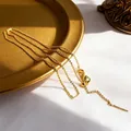 Gold-plated adjustable chain necklace with slim bar pendant on decorative metal tray - Gold Universal Chain
