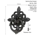 Vintage cast iron door knocker with floral carvings measuring 20x19.5cm in dark finish - Retro Black