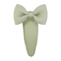 Detail of light green grosgrain ribbon bow hair clip with textured fabric and snap closure - Light Green