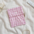 Pink checkered floral sanitary napkin storage pouch with white snap button closure - Bubble Red Grid